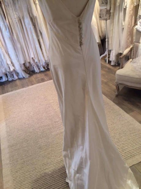 The Evaline gown by Karen Willis Holmes is a gorgeous dress. A stiff bias gown in silk with zipper and button back. This Karen Willis Holmes gown is available to try on at The Barefaced Bride studio.