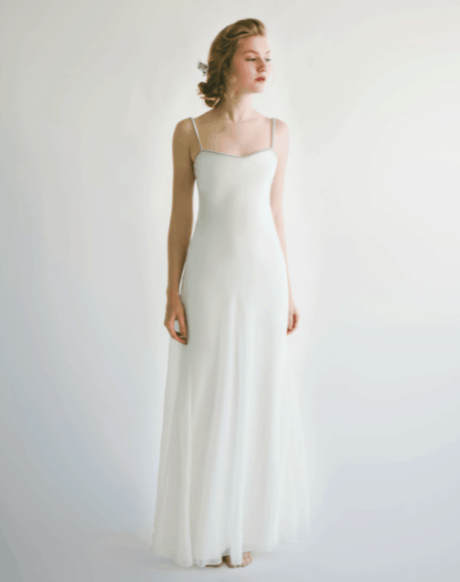 The Calista gown by Amanda Garrett is truly stunning. Silk georgette perfectly cut bias cut gown with a fine line of hand embroidered Swarovski crystals and beads to define the neckline and straps. This designer wedding dress is available to try on at The Barefaced Bride studio.