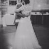 Breathtaking and unique Charlotte gown by Reem Acra. This stunning gown features an illusion neckline and nude lining. Lace bodice with off the shoulder sleeve and romantic tulle. This preloved Reem Acra gown is available to try on at The Barefaced Bride studio.