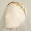 The Cleo Crown by Elizabeth Bower is a modern Grecian laurel crown, featuring brass stamped leaves. This brand new headpiece is available to try on at The Barefaced Bride studio.