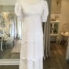 'Daffie' is a beautiful vintage gown is from the 1960s. A tiered cotton embroidered dress in size 6 - 8 $575. This vintage dress is available to try on at The Barefaced Bride studio.