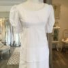 'Daffie' is a beautiful vintage gown is from the 1960s. A tiered cotton embroidered dress in size 6 - 8 $575. This vintage dress is available to try on at The Barefaced Bride studio.